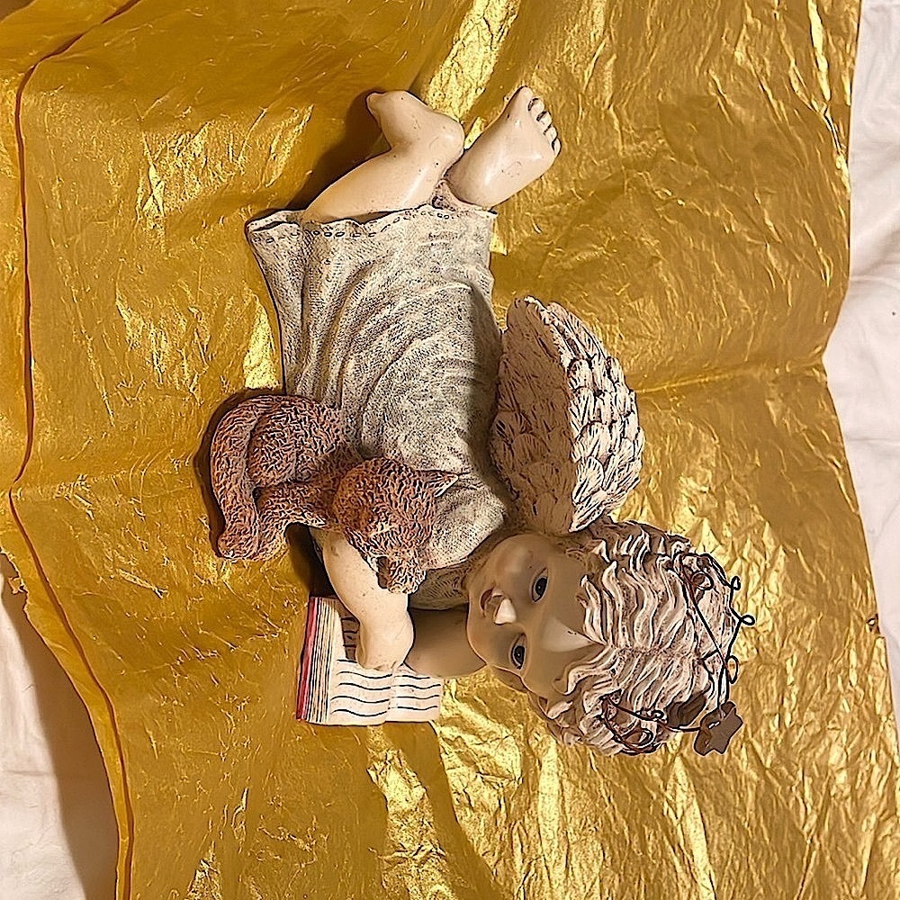 Porcelain ceramic angel music box.